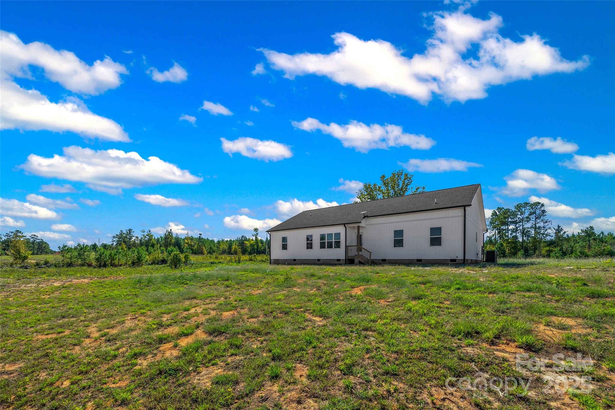 4822 Bull Run Road Blackstock, SC 29014 - Photo 27 of 34 a view of a house with a big yard