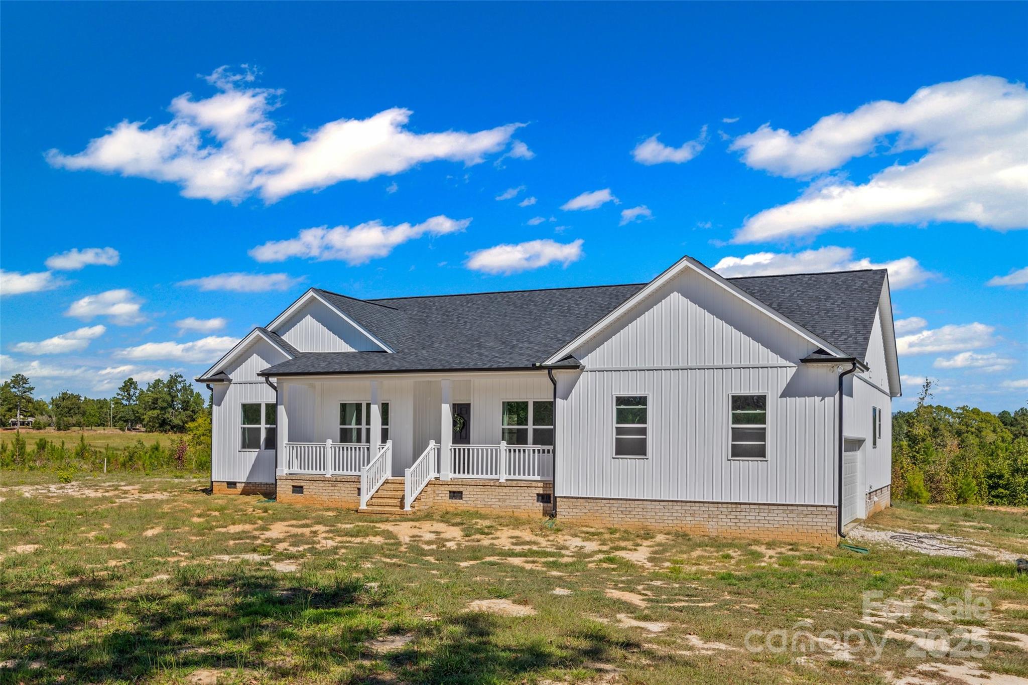 4822 Bull Run Road Blackstock, SC 29014 - Photo 28 of 34 a front view of a house with a garden