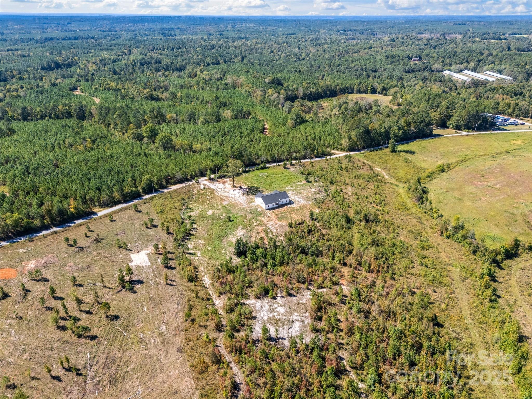 4822 Bull Run Road Blackstock, SC 29014 - Photo 31 of 34 a view of a backyard of a house with a street