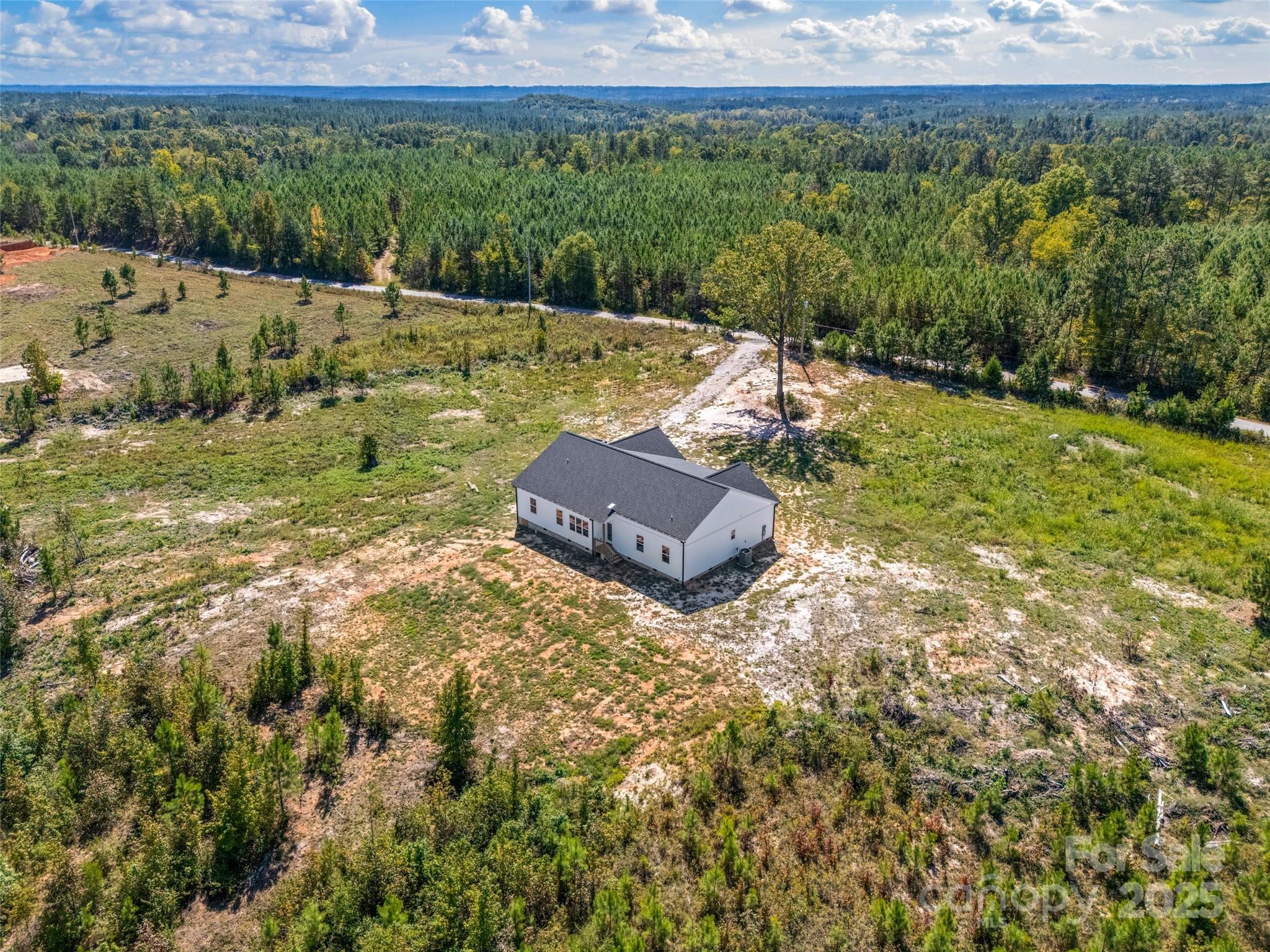 4822 Bull Run Road Blackstock, SC 29014 - Photo 33 of 34 a view of a yard with an outdoor seating