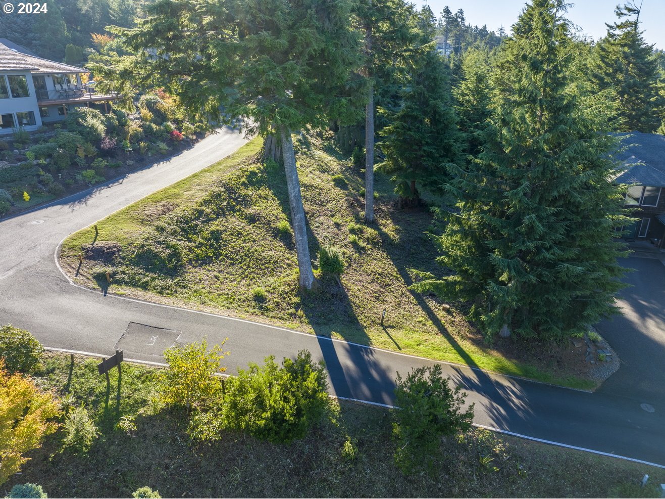 425 Surf View Drive Siletz, OR 97380 - Photo 11 of 15 a view of swimming pool with a yard and seating area