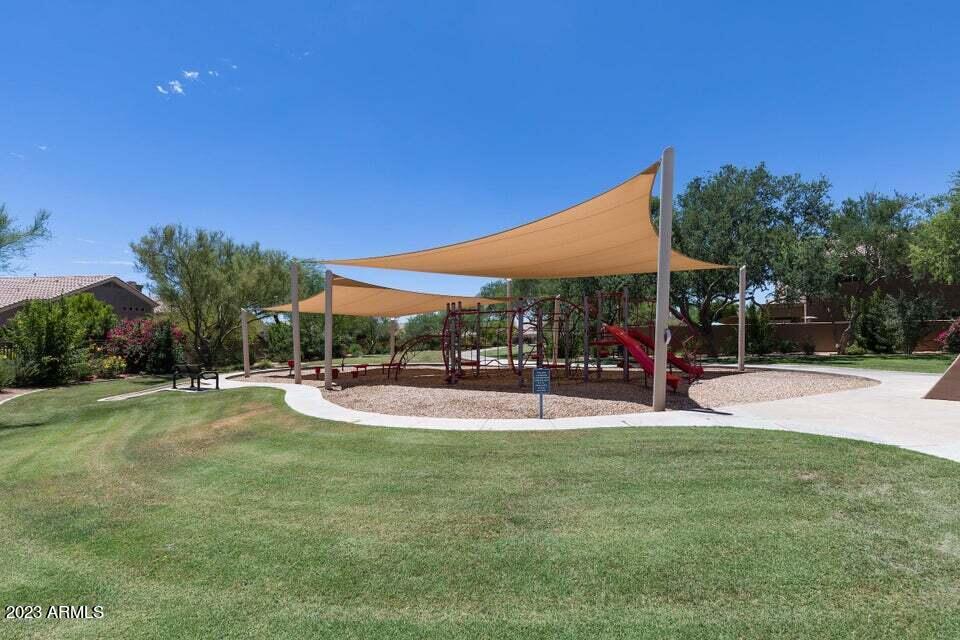 7338 East Wingspan Way Scottsdale, AZ 85255 - Photo 32 of 32 a view of a playground with basketball court