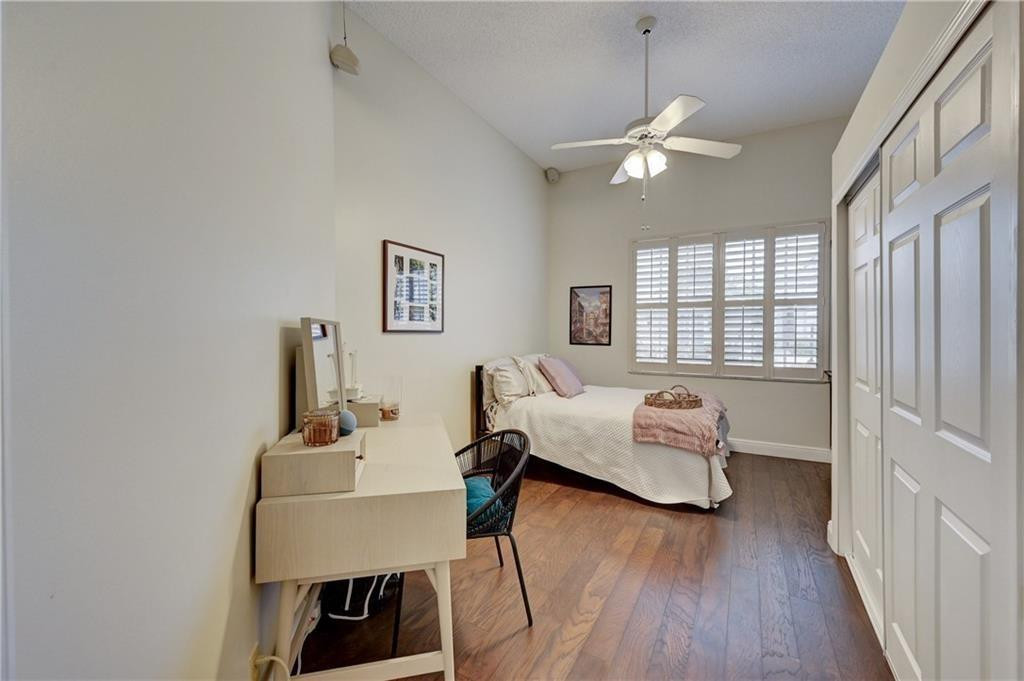 8171 Hampton Wood Drive Boca Raton, FL 33433 - Photo 21 of 56 a living room with furniture and a wooden floor