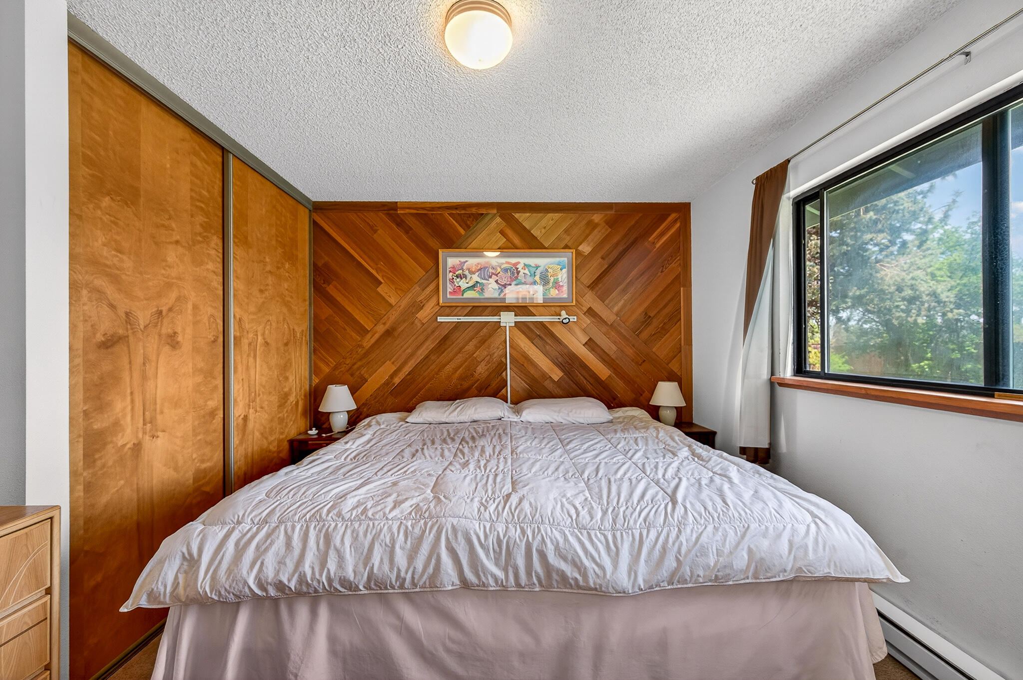 60866 Brosterhous Road Bend, OR 97702 - Photo 26 of 41 a bedroom with a bed and window