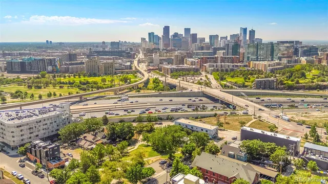 a view of a city with tall buildings
