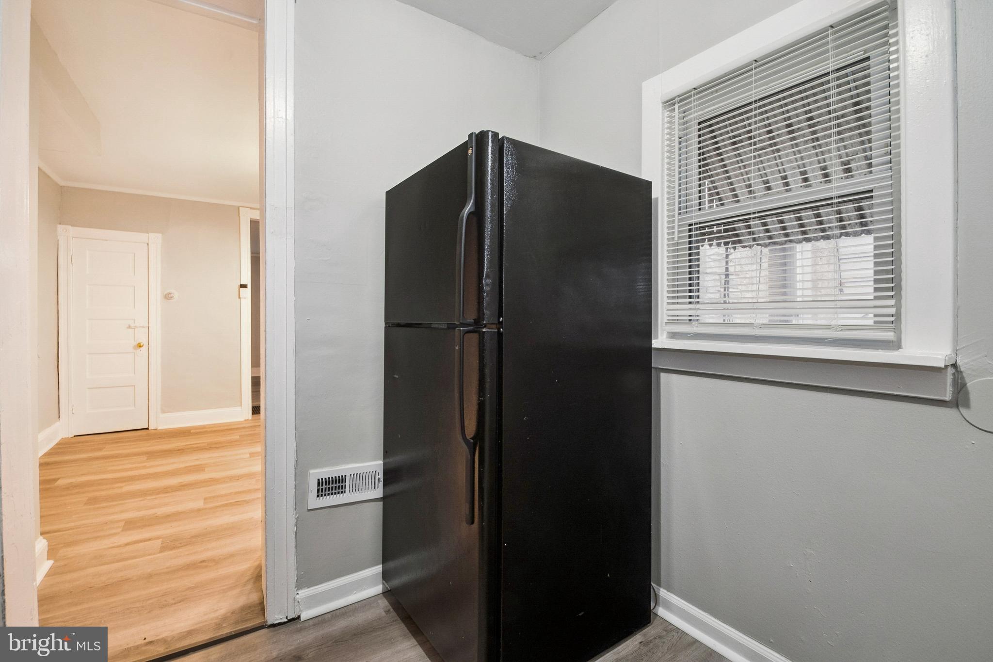 3020 Mathews Street Baltimore, MD 21218 - Photo 13 of 25 a bathroom with a shower and a cabinet