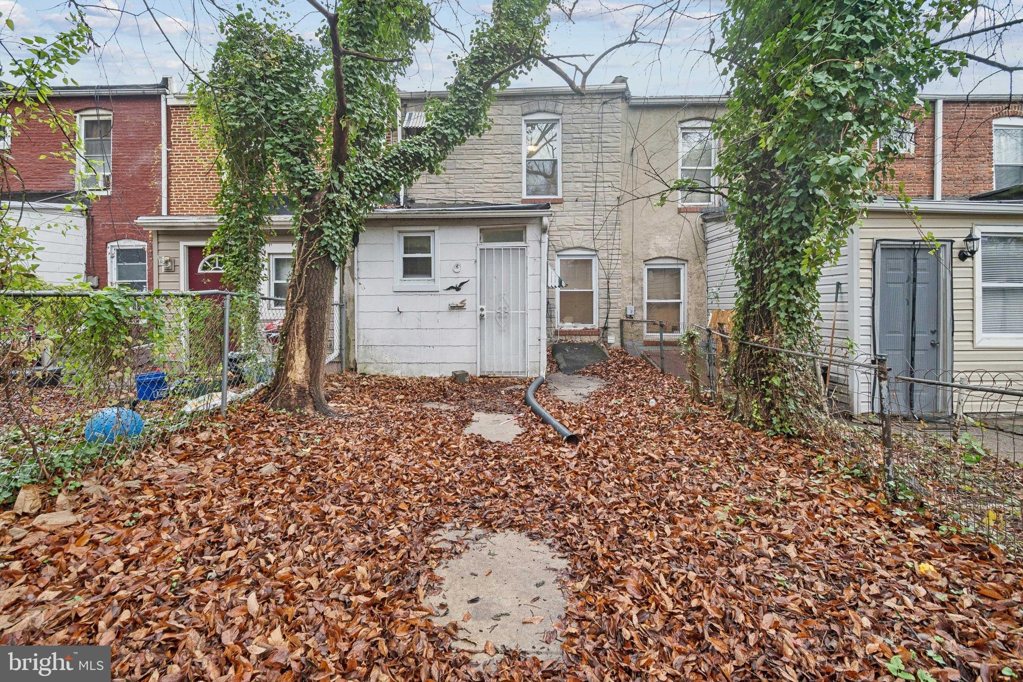 3020 Mathews Street Baltimore, MD 21218 - Photo 25 of 25 front view of a house with a yard
