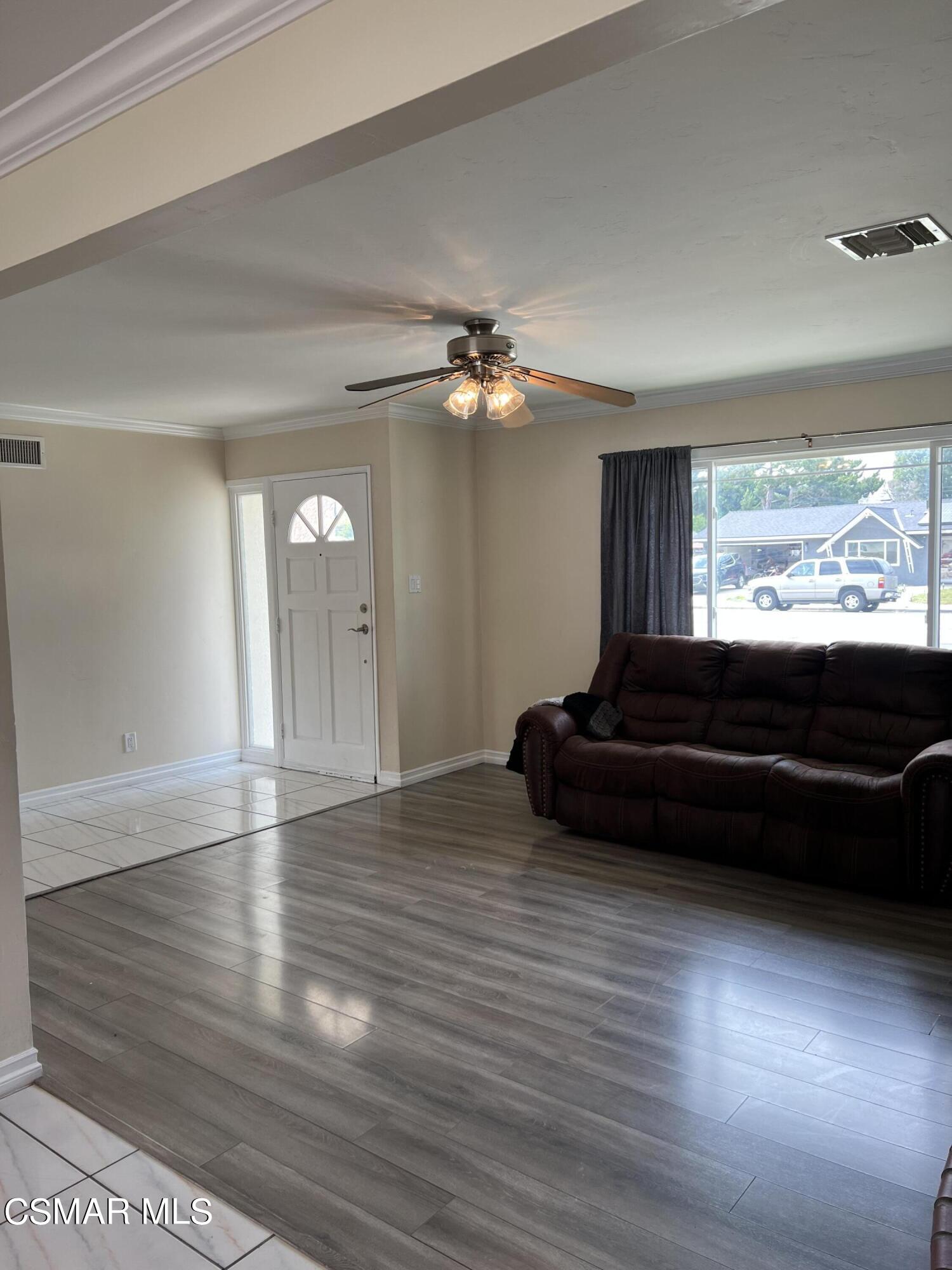 3546 Royal Avenue Simi Valley, CA 93063 - Photo 19 of 26 a living room with couch and a large window