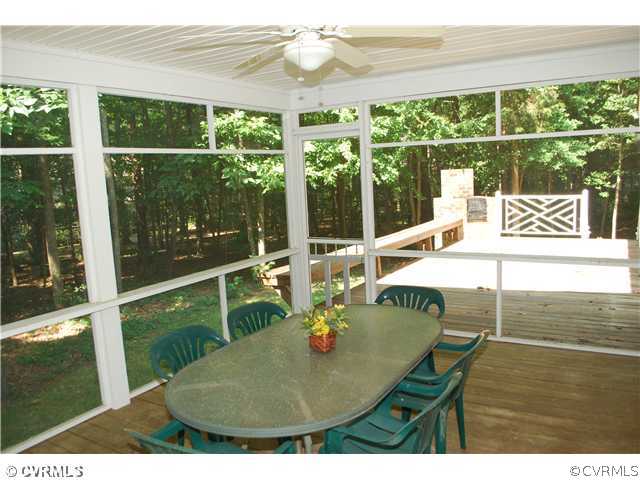 3908 Timber Ridge Place Midlothian, VA 23112 - Photo 11 of 12 a view of a dining room with furniture window and outside view