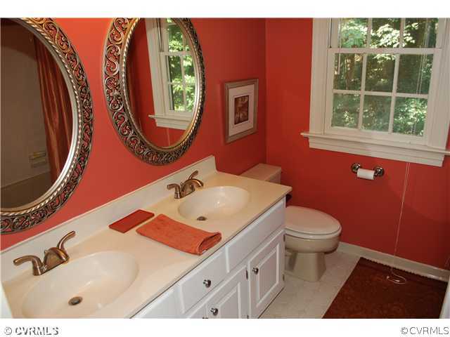 3908 Timber Ridge Place Midlothian, VA 23112 - Photo 7 of 12 a bathroom with a toilet sink and mirror