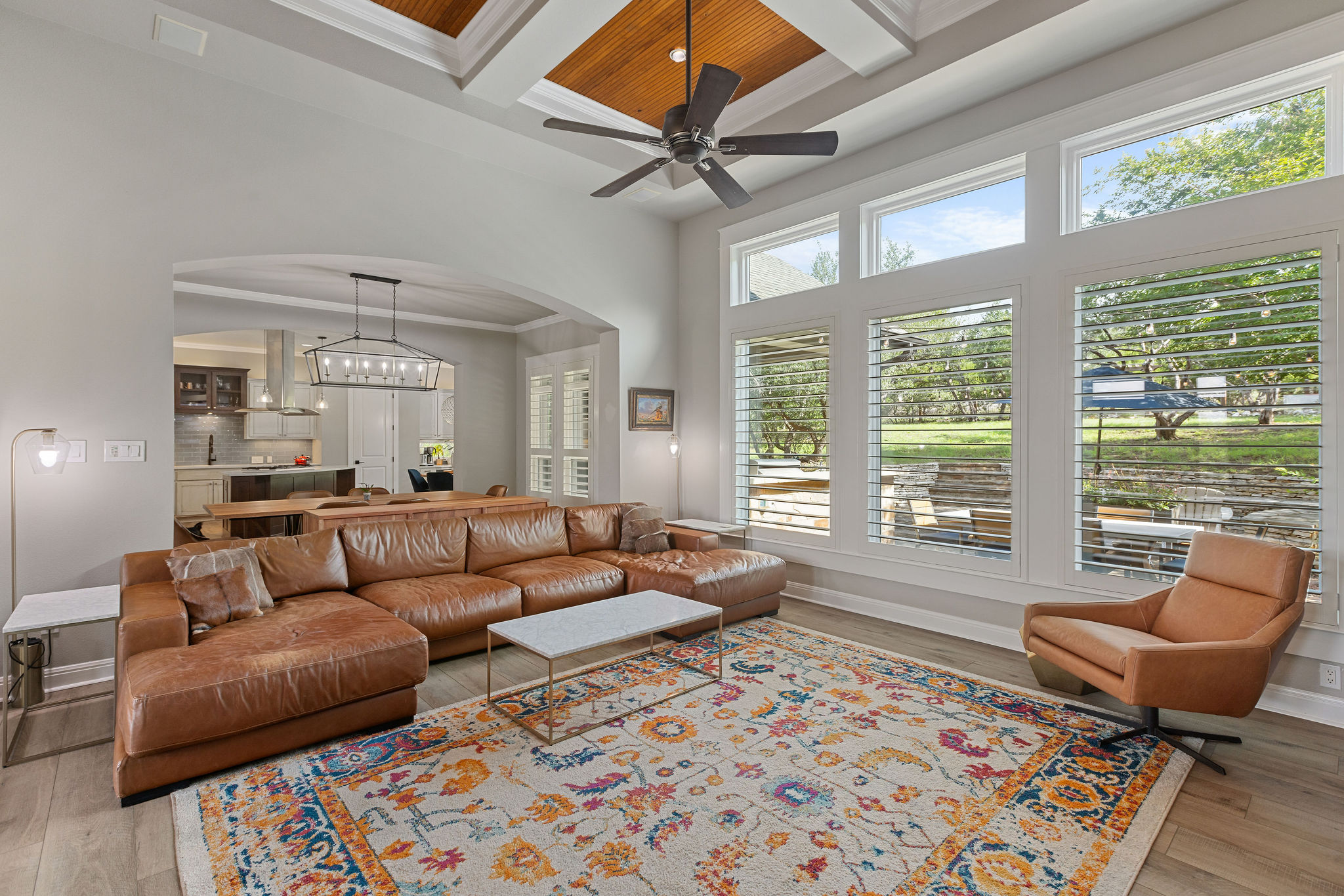 279 Rugged Earth Drive Austin, TX 78737 - Photo 11 of 40 a living room with furniture and a large window
