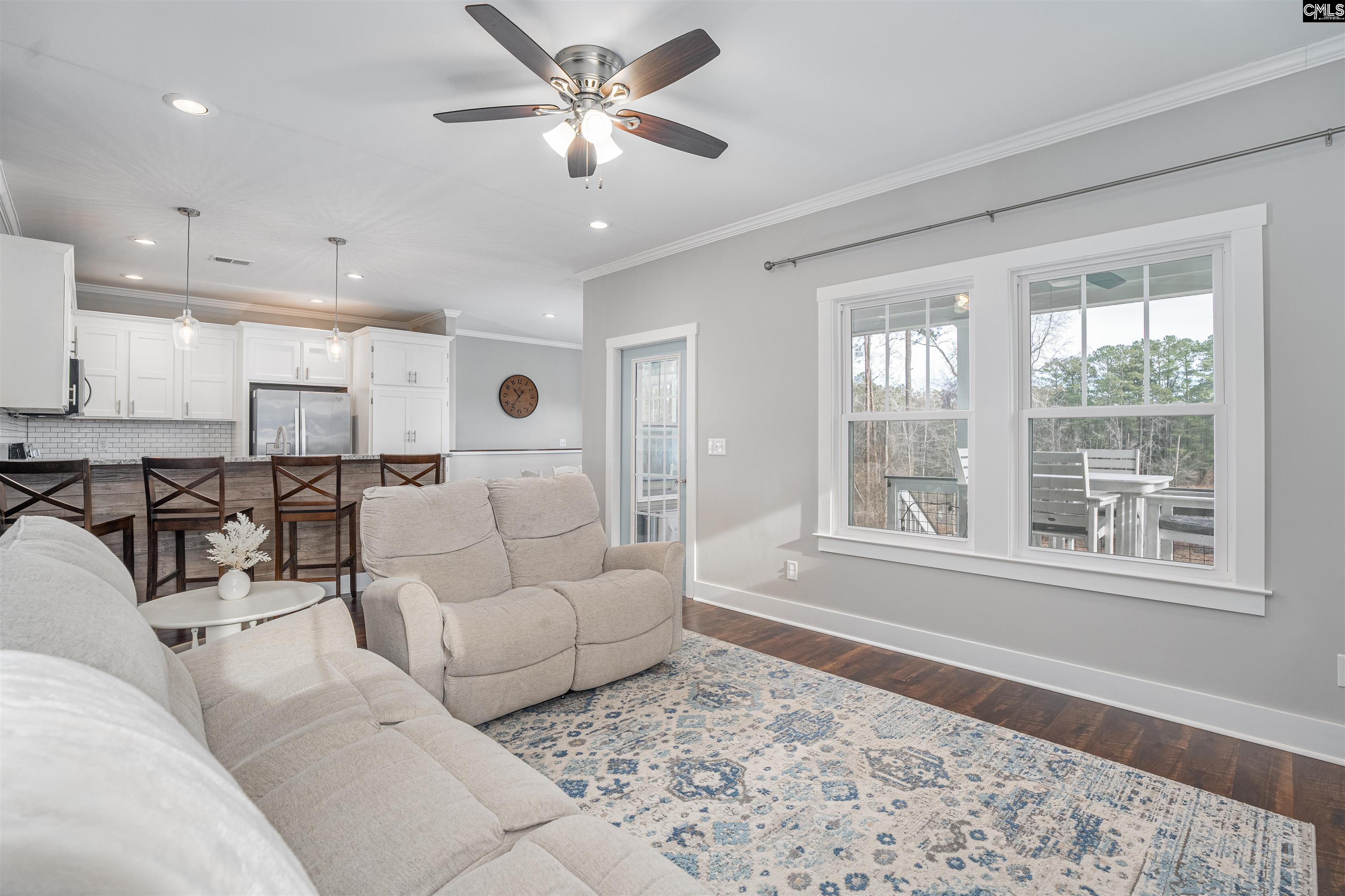 649 Sandbar Road Chapin, SC 29036 - Photo 9 of 40 a living room with furniture and a window