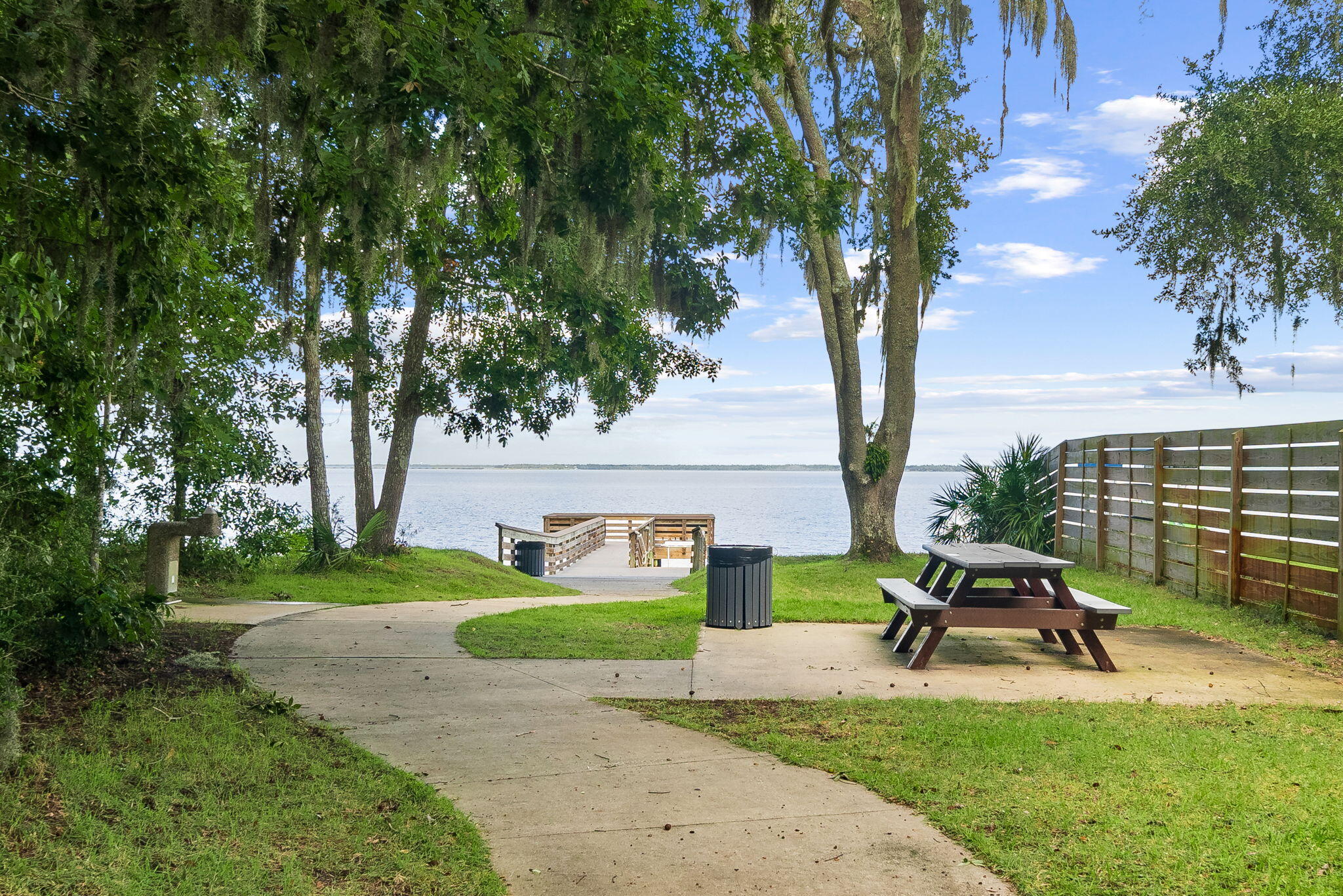 Lot 11 Riker Avenue Santa Rosa Beach, FL 32459 - Photo 6 of 6 a white bench sitting in the middle of a park