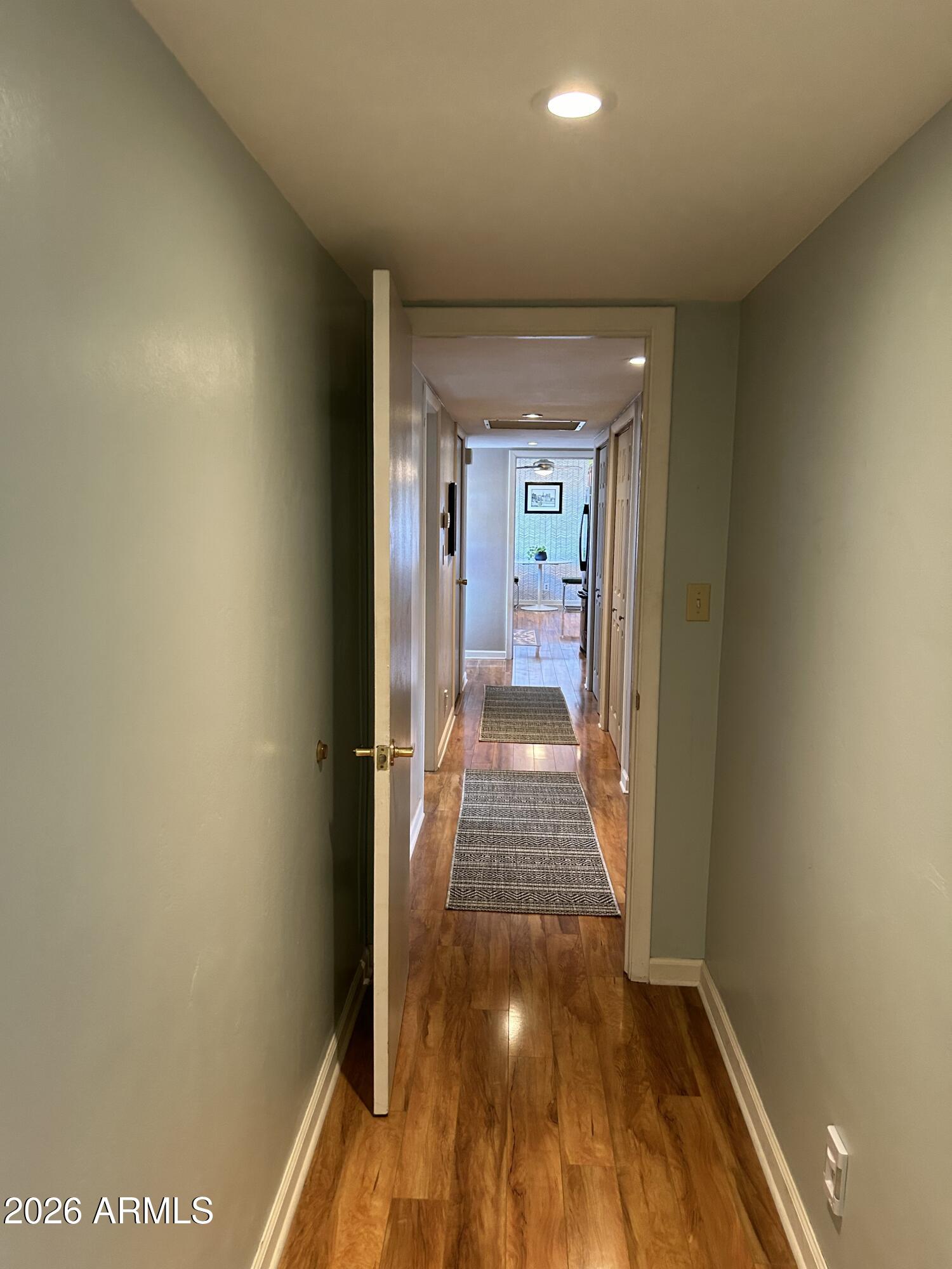 100 West Maryland Avenue, Unit O2 Phoenix, AZ 85013 - Photo 12 of 23 a view of a hallway with wooden floor