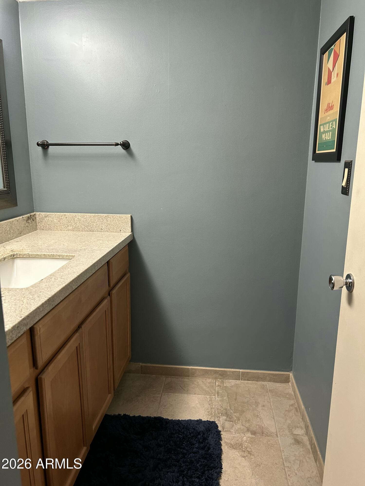 100 West Maryland Avenue, Unit O2 Phoenix, AZ 85013 - Photo 20 of 23 a bathroom with a sink and a mirror