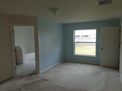 2318 Southeast Merrill Road Port St. Lucie, FL 34952 - Photo 14 of 18 MASTER BED