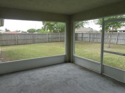 2318 Southeast Merrill Road Port St. Lucie, FL 34952 - Photo 16 of 18 PORCH