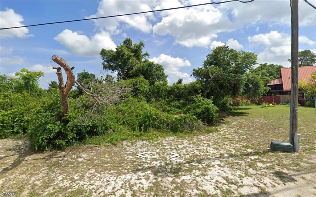 1783 Barrow Street Deltona, FL 32725 - Photo 2 of 2 a backyard of a house with lots of green space