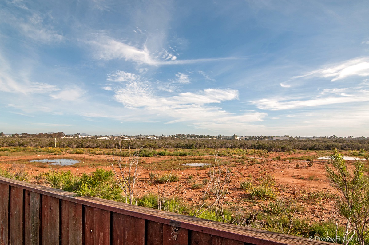 7667 Backer Road San Diego, CA 92126 - Photo 14 of 24 Looking East over the back fence into the preserve