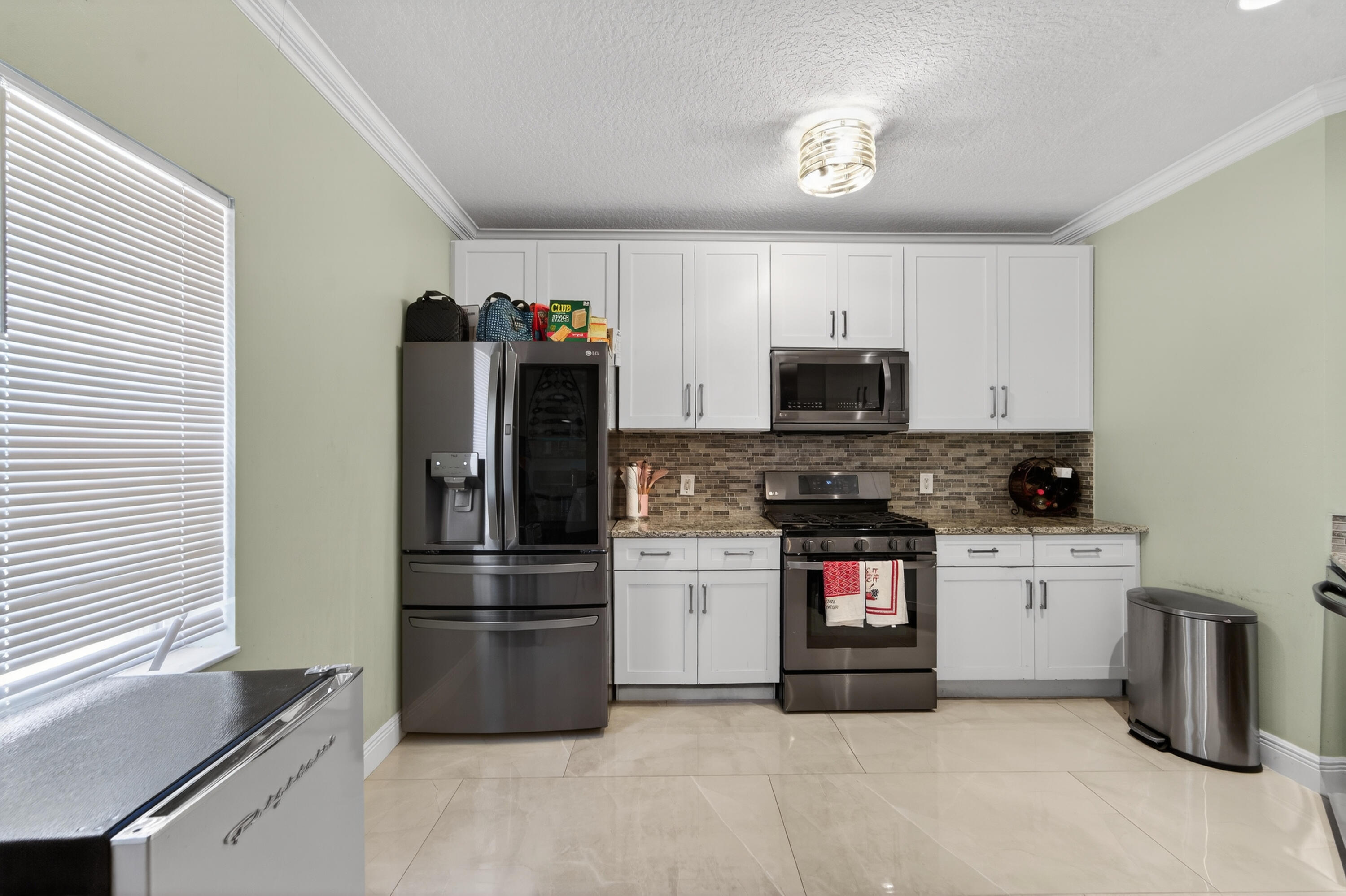 162 Baldwin Boulevard Greenacres, FL 33463 - Photo 6 of 34 162BaldwinBlvdGreenacres_04