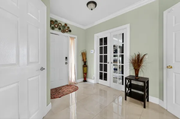 a view of a livingroom with furniture and a window