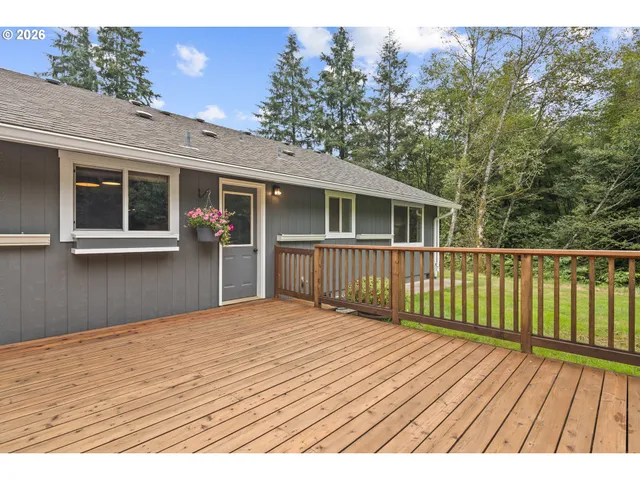 a view of a yard with a tree