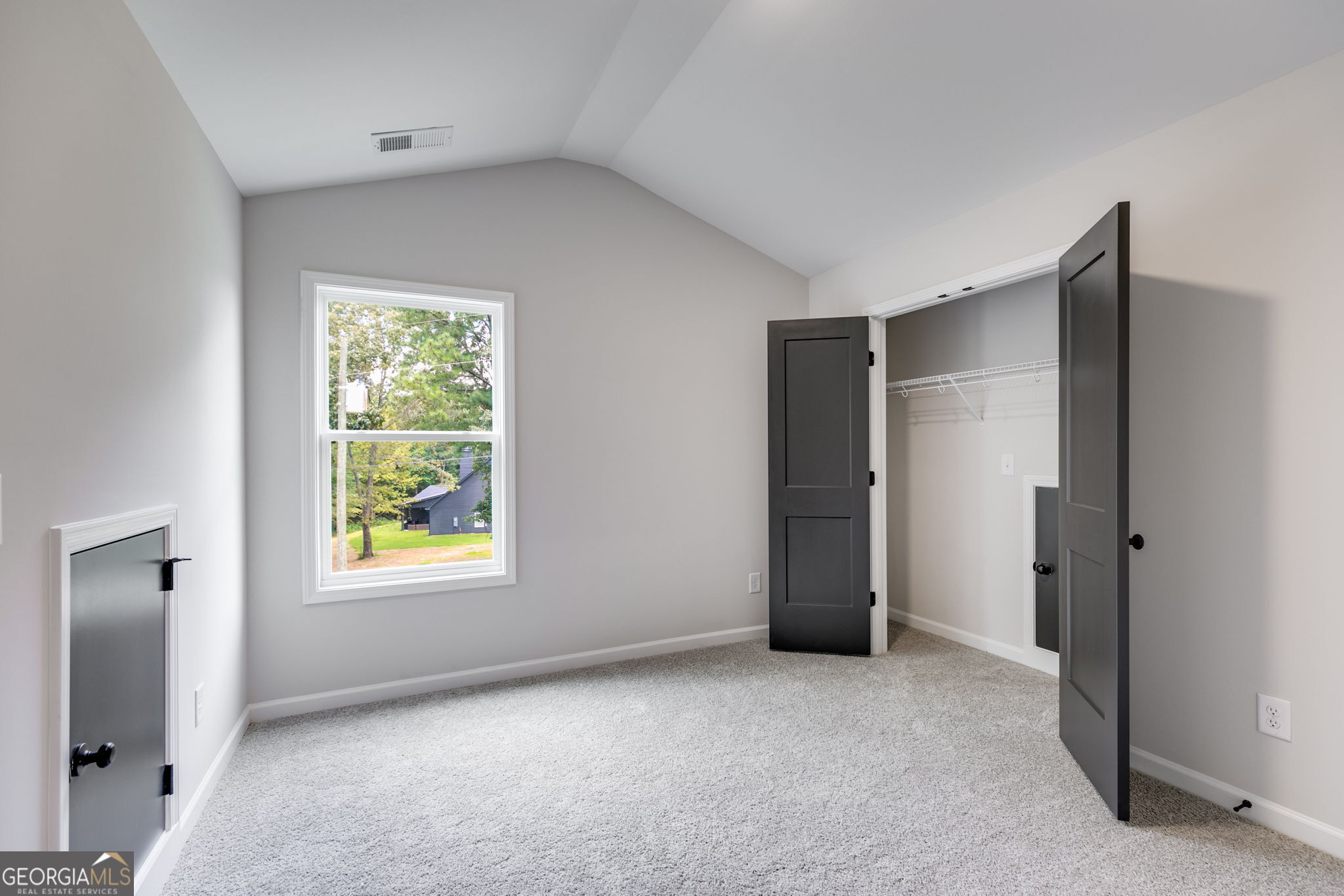 10 Avery Road Roopville, GA 30170 - Photo 33 of 46 an empty room with windows and closet