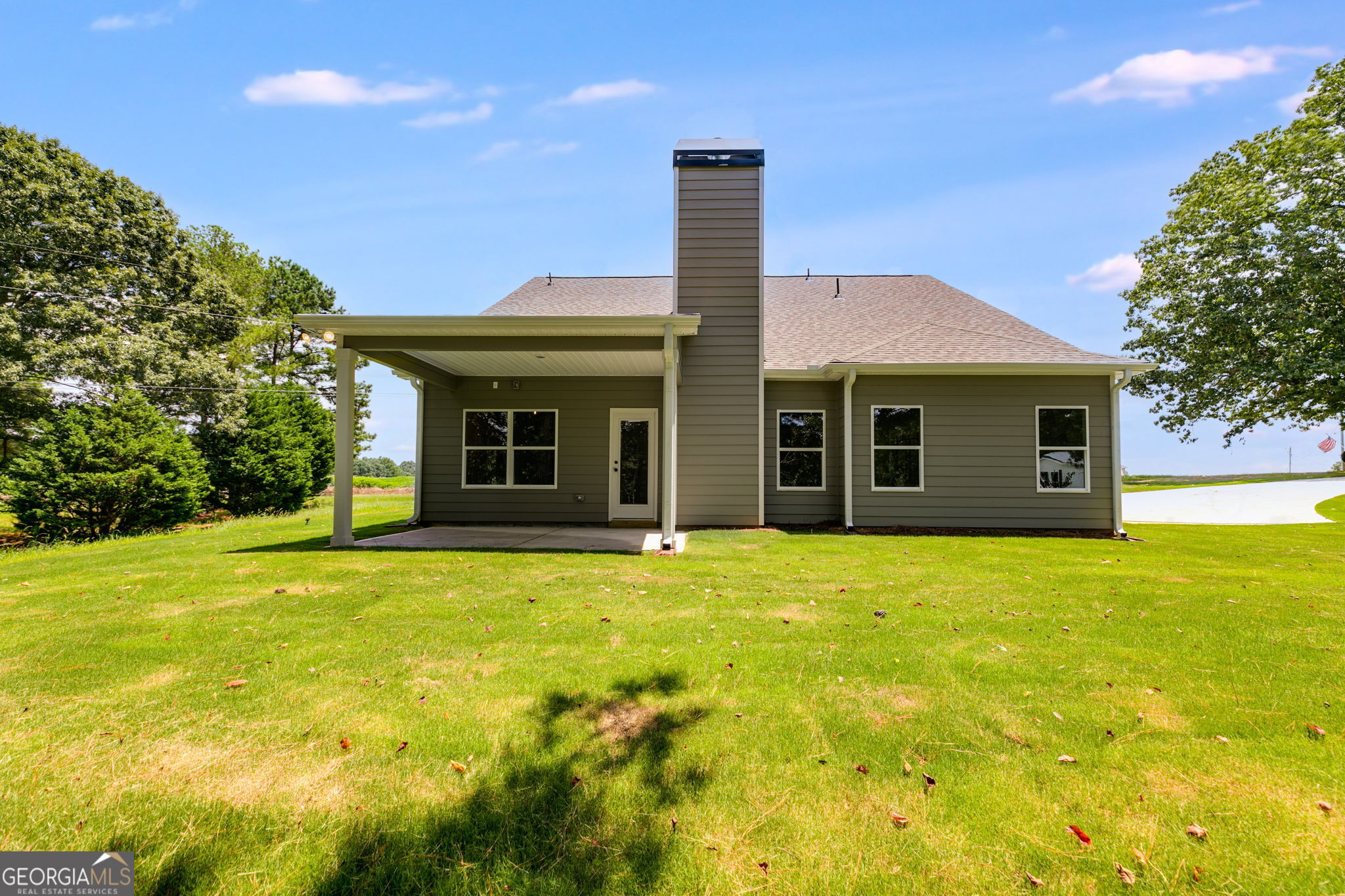 10 Avery Road Roopville, GA 30170 - Photo 40 of 46 a view of a house with a garden and yard