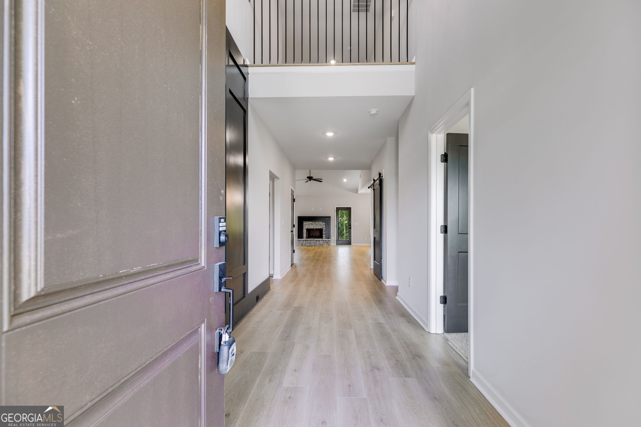10 Avery Road Roopville, GA 30170 - Photo 4 of 46 a view of a hallway with wooden floor and staircase