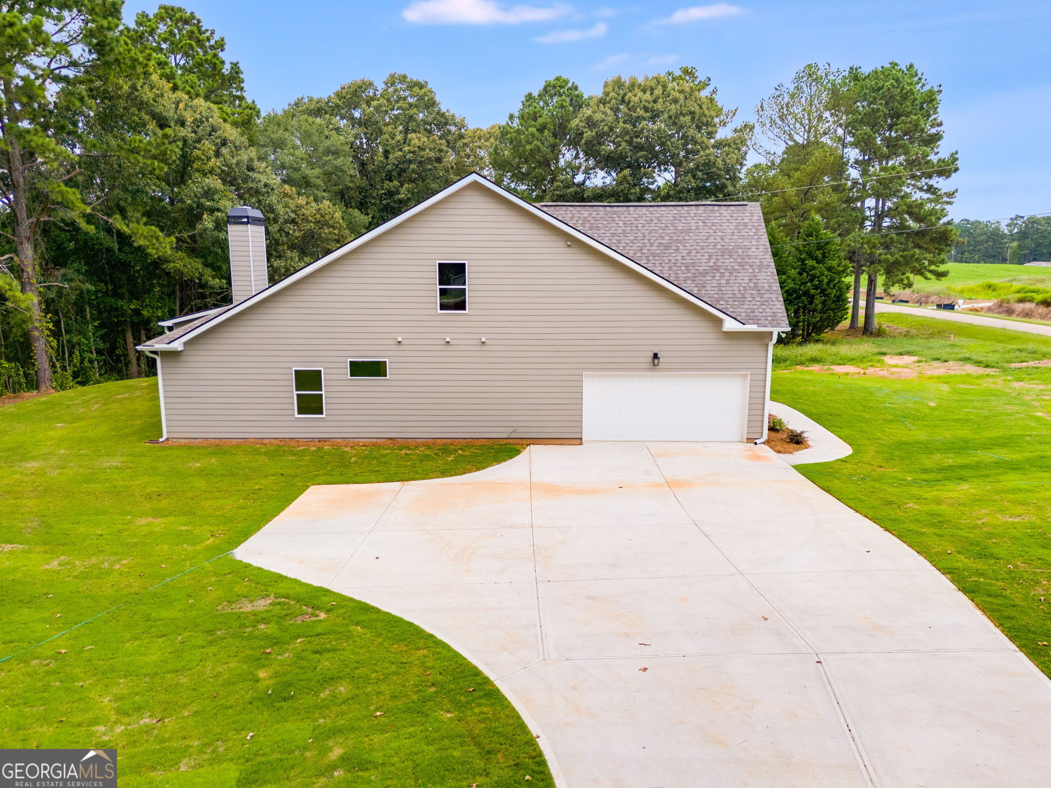 10 Avery Road Roopville, GA 30170 - Photo 45 of 46 a view of a backyard with a garden