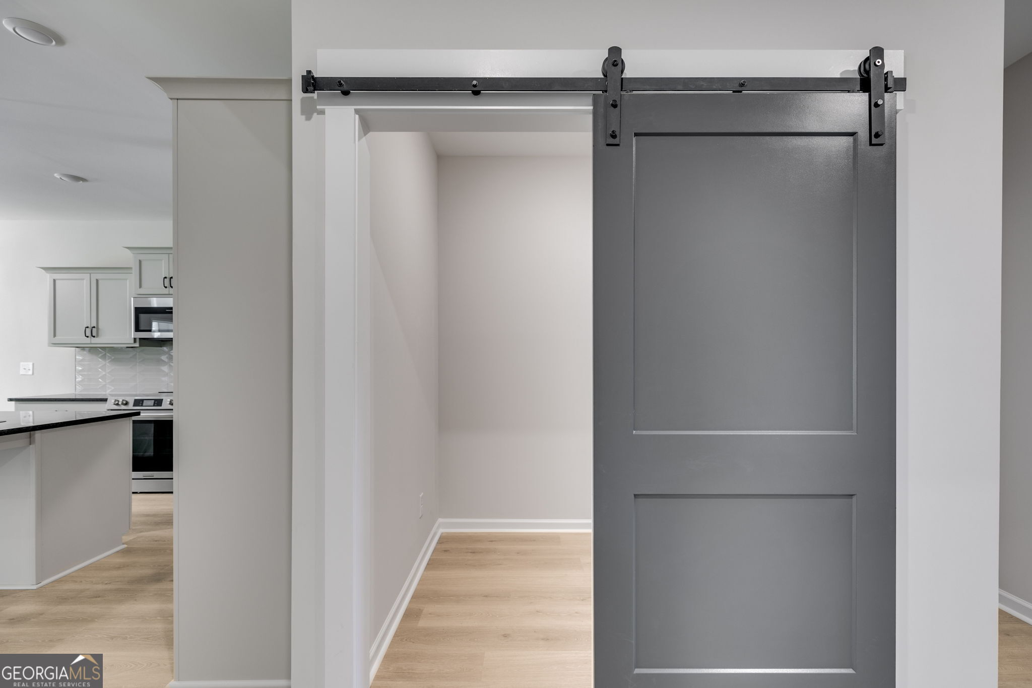 10 Avery Road Roopville, GA 30170 - Photo 6 of 46 a view of walk in closet with empty racks