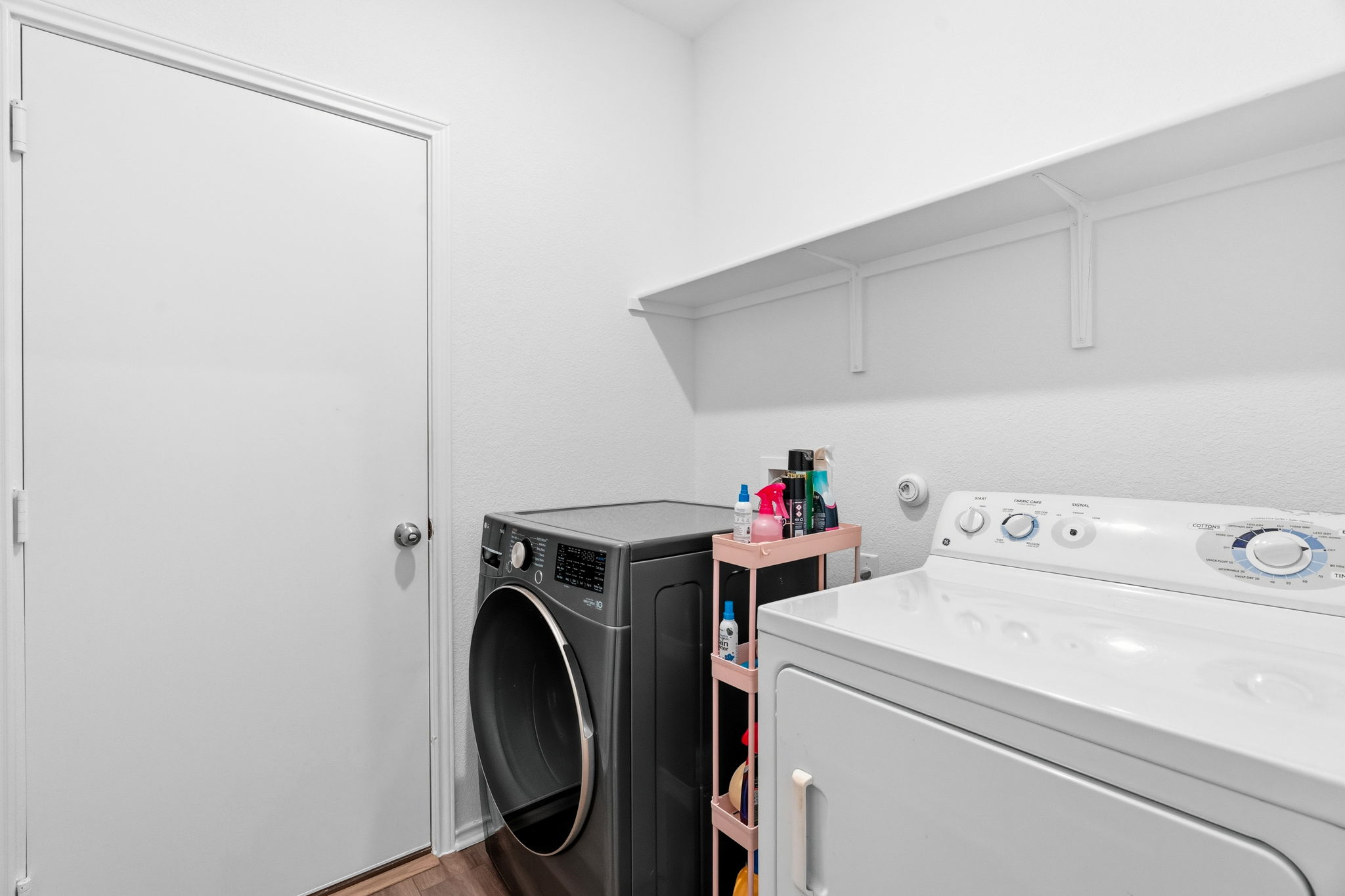 1600 Hope Rnch Road Leander, TX 78641 - Photo 21 of 23 a utility room with dryer and washer