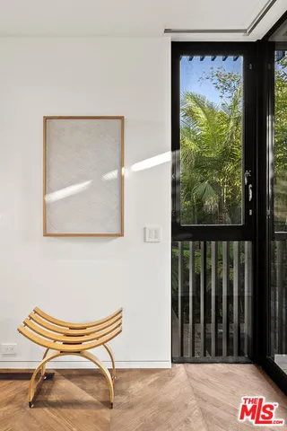 a bathroom with a shower sink and mirror