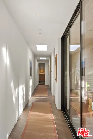 a living room with a couch furniture and a window