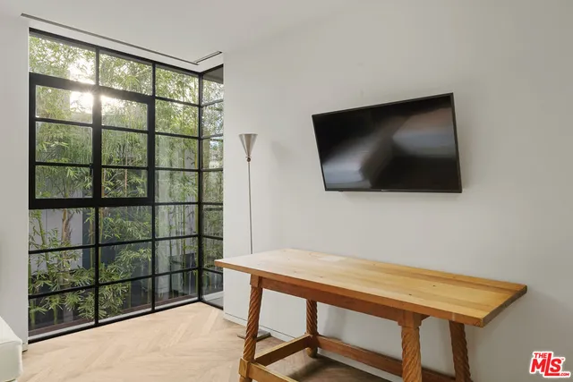 a bathroom with a sink a mirror and shower