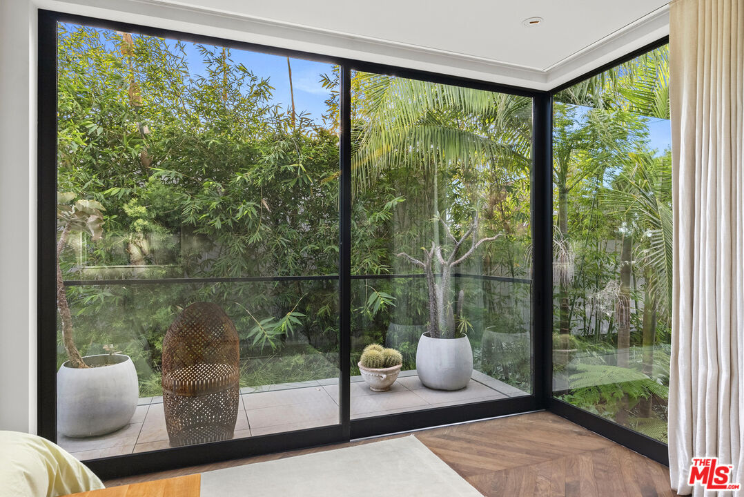 634 Milwood Avenue Venice, CA 90291 - Photo 37 of 40 a view of a room with a large window and sitting area