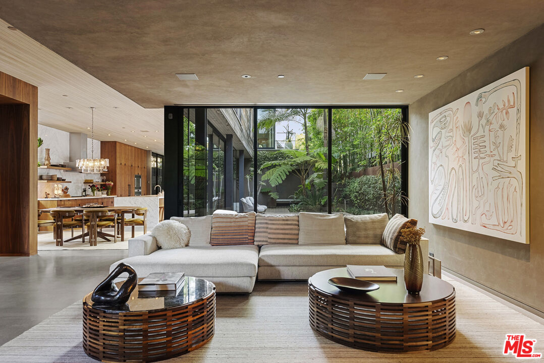 634 Milwood Avenue Venice, CA 90291 - Photo 7 of 40 a living room with furniture and a large window