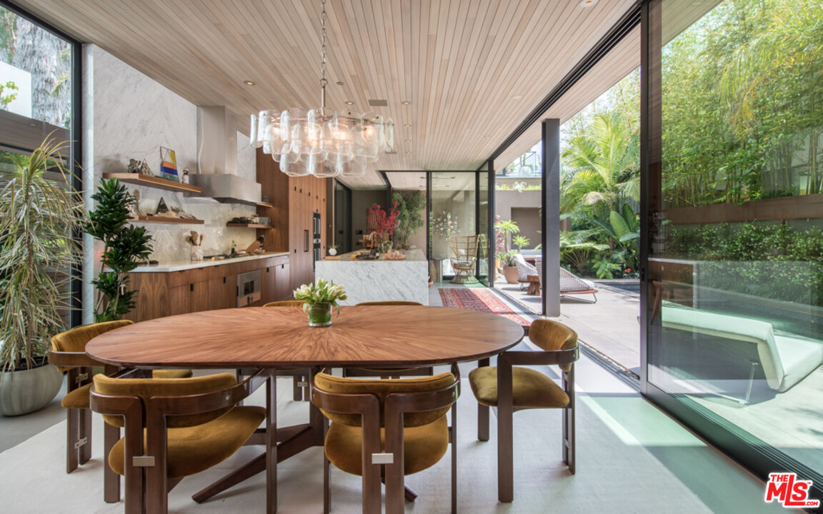 634 Milwood Avenue Venice, CA 90291 - Photo 10 of 40 a view of a dining room with furniture window and outside view