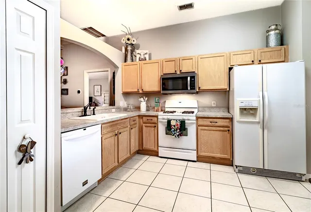 a view of a livingroom with furniture and window