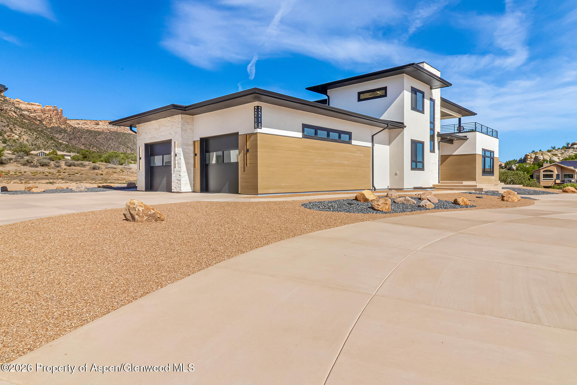 2216 Rimrock Road Grand Junction, CO 81507 - Photo 9 of 84 a front view of a house with a yard