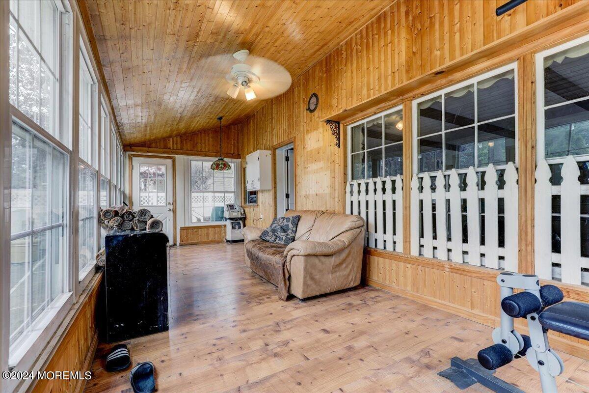 106 Forest Road Brick, NJ 08724 - Photo 12 of 23 a living room with furniture and a large window