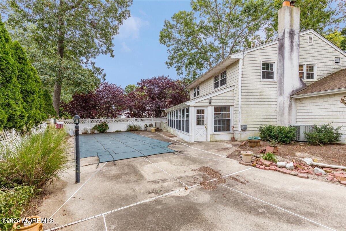 106 Forest Road Brick, NJ 08724 - Photo 16 of 23 a front view of a house with a yard