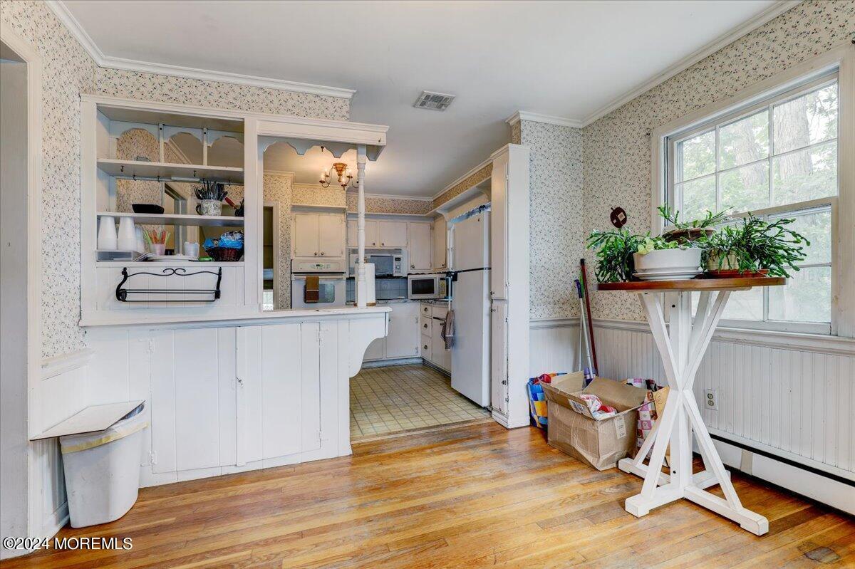 106 Forest Road Brick, NJ 08724 - Photo 5 of 23 a living room with furniture a potted plant and a table