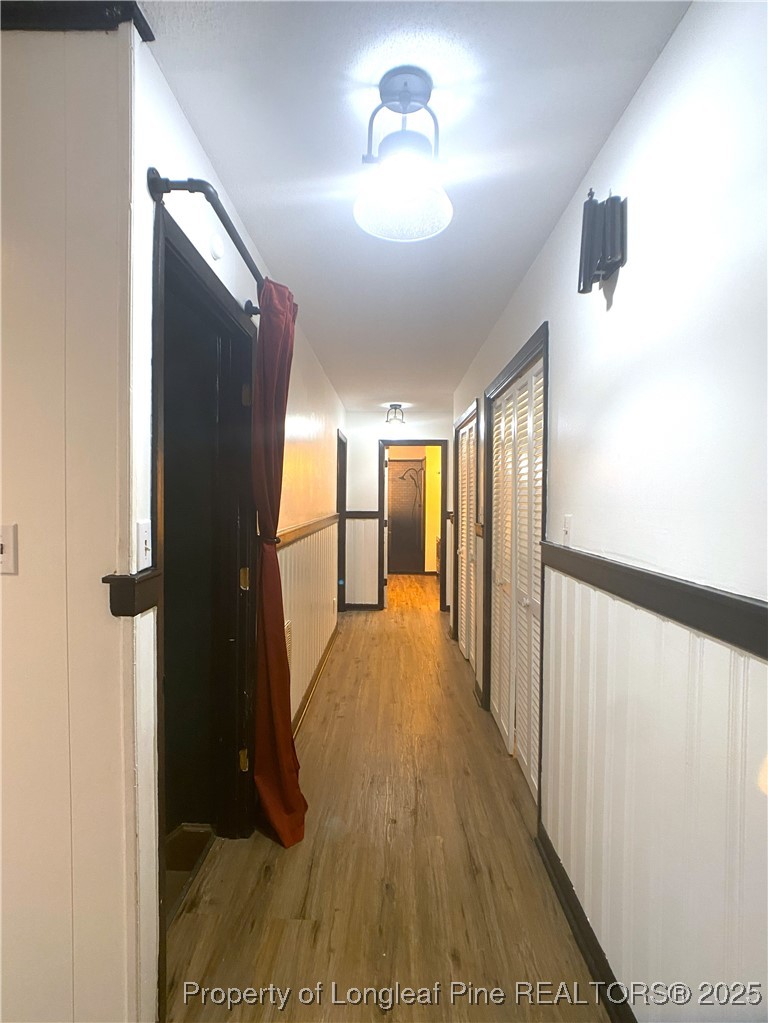 2405 Morganton Road Fayetteville, NC 28303 - Photo 20 of 46 a view of gallery with wooden floor