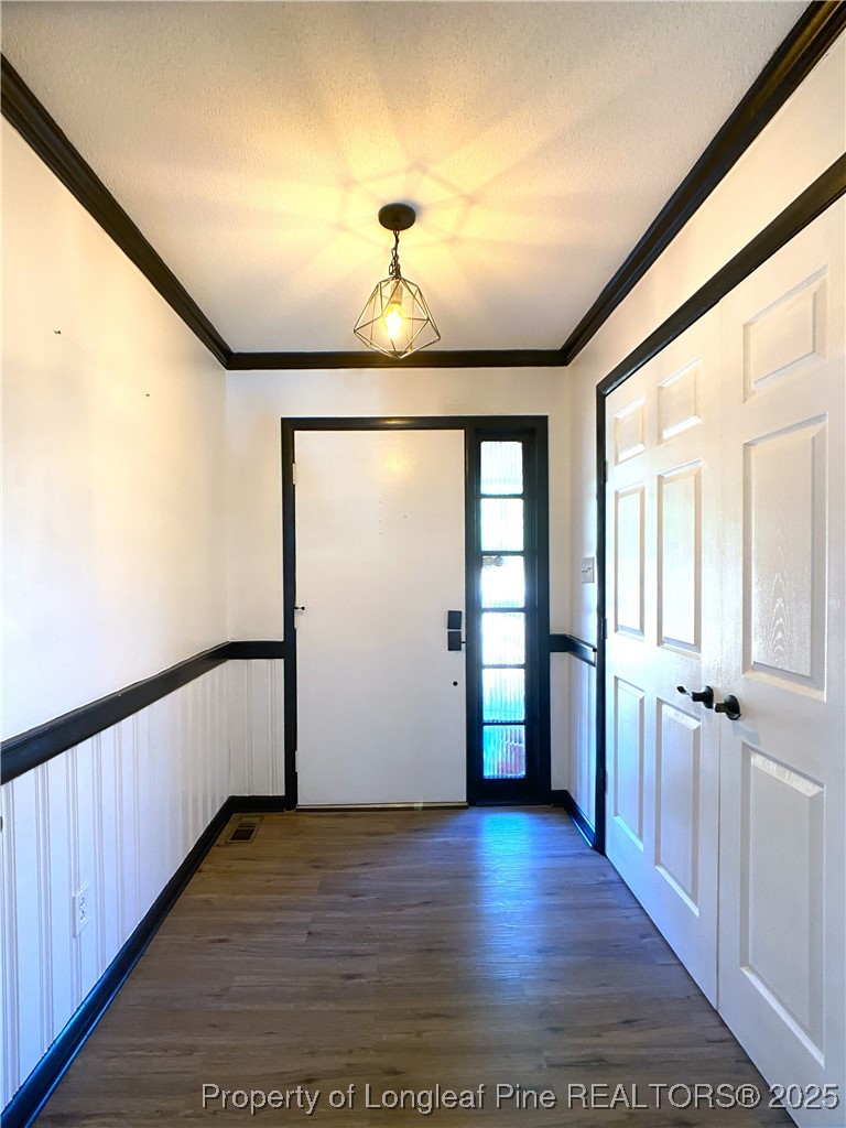 2405 Morganton Road Fayetteville, NC 28303 - Photo 5 of 46 a view of a hallway with wooden floor and staircase