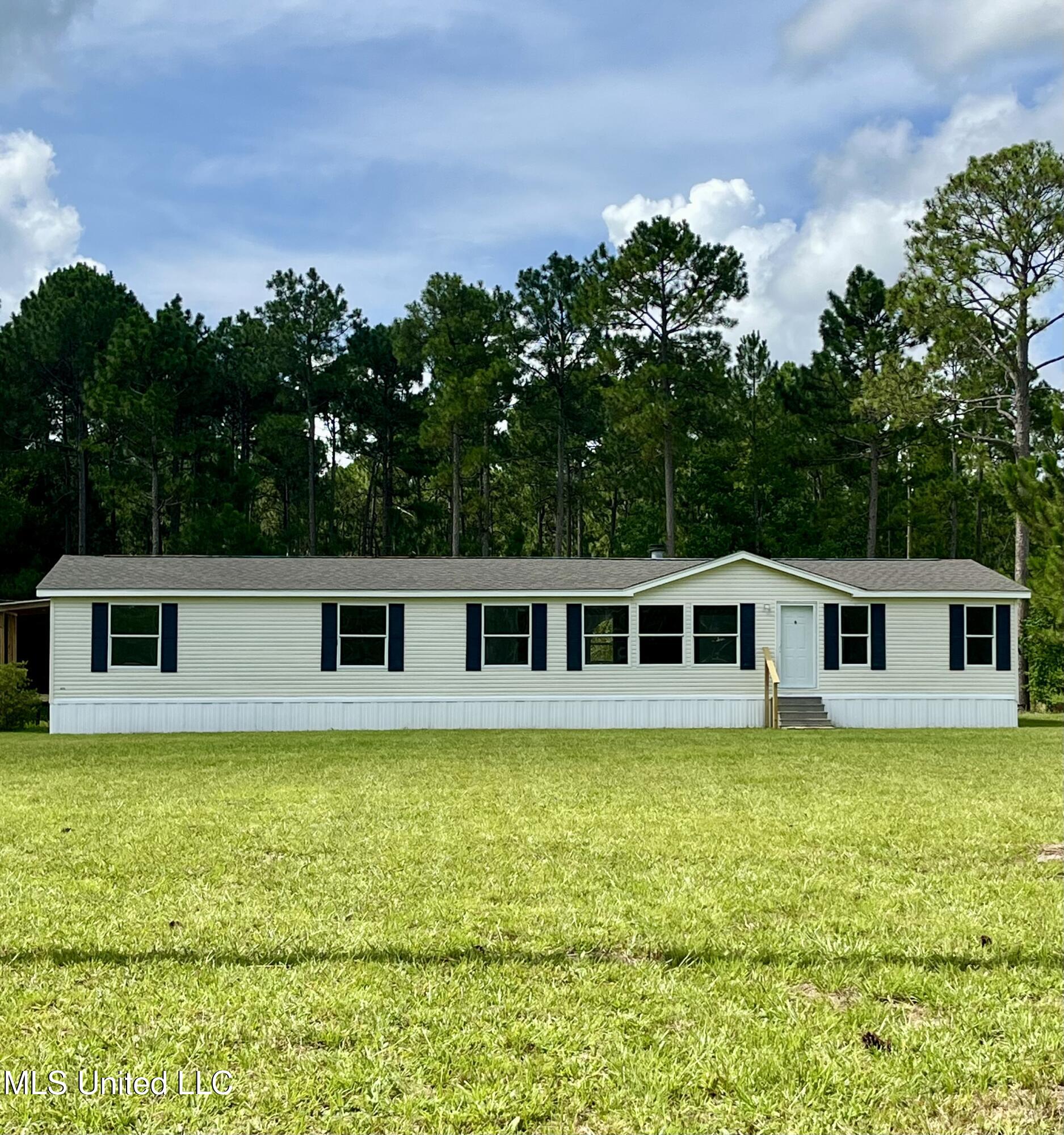 11405 Jim Ramsay Road Vancleave, MS 39565 - Photo 1 of 22 Front