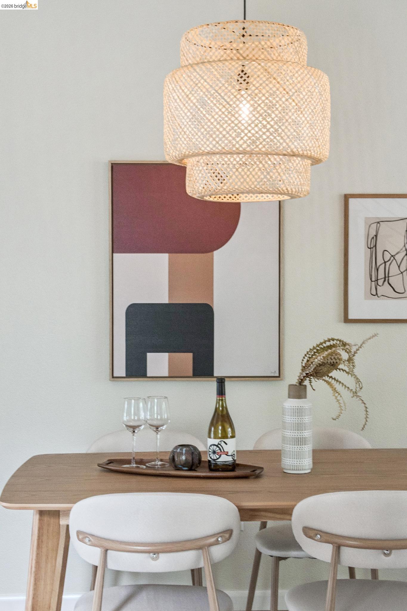 61 Glashaus Loop Emeryville, CA 94608 - Photo 15 of 39 a dining room with table chairs and a chandelier
