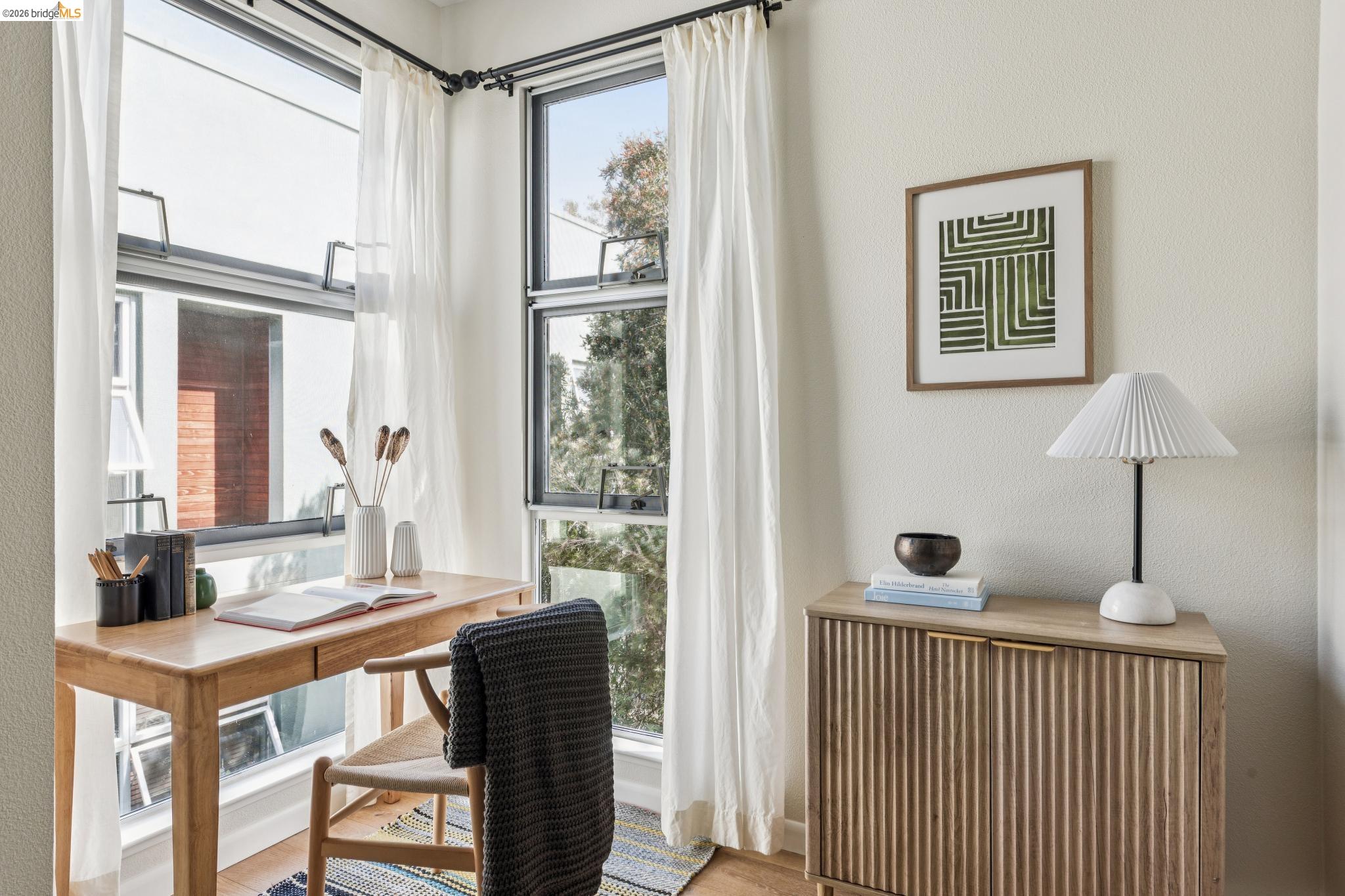 61 Glashaus Loop Emeryville, CA 94608 - Photo 29 of 39 a bedroom with furniture and a window