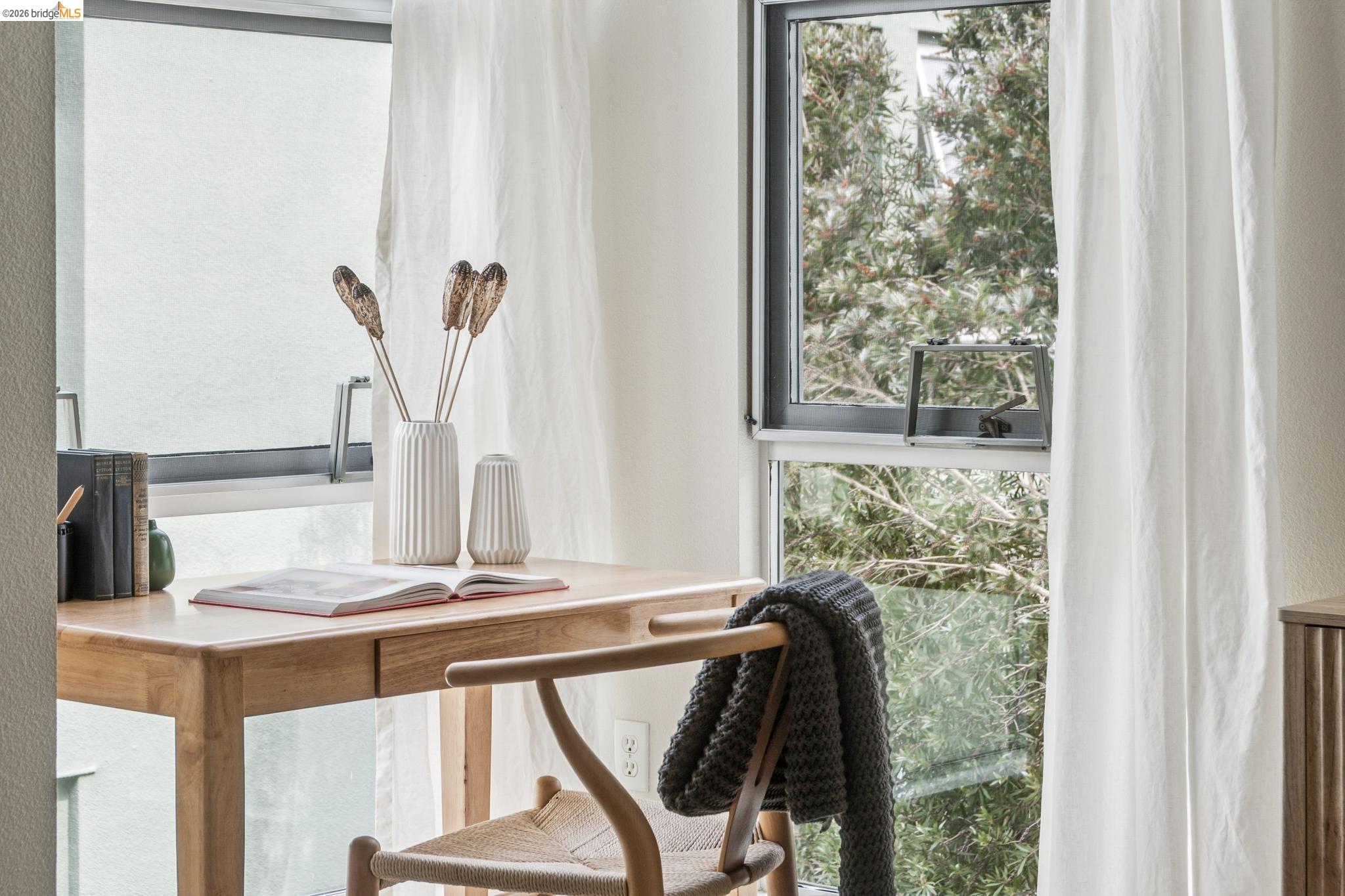 61 Glashaus Loop Emeryville, CA 94608 - Photo 30 of 39 a view of a living room with furniture and a window