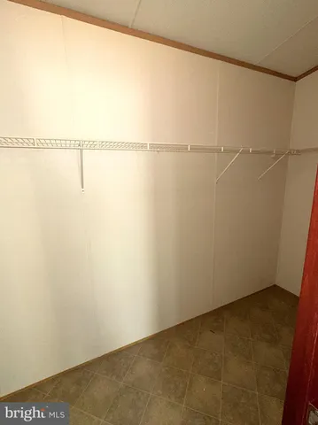 a view of small space with racks on the wall